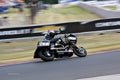 King of the Baggers racer at speed at Road America, 2023