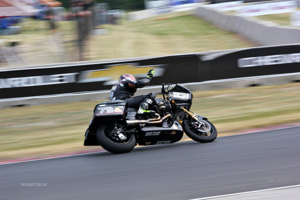 King of the Baggers racer at speed at Road America, 2023