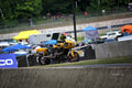 Yellow King of the Baggers race bike on track at MotoAmerica Road America, 2023