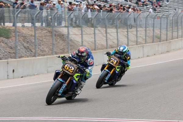 MotoAmerica King of the Baggers machines lined up in pit lane at Mid-Ohio Sports Car Course