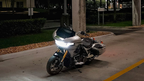 V-Twin Bikers gray CVO Road Glide build parked at night