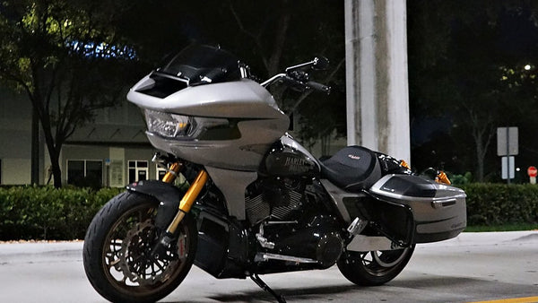 V-Twin Bikers gray CVO Road Glide build, front three-quarter view at night
